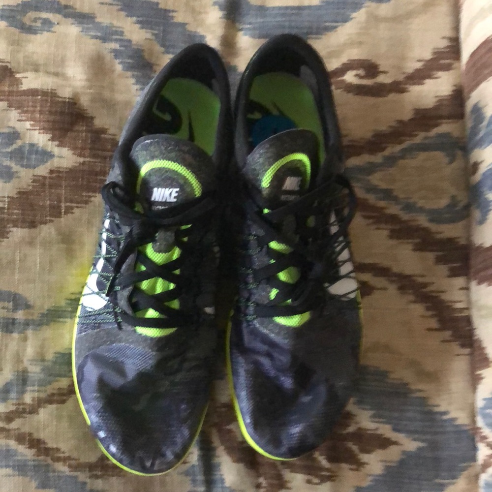 Nike victory xc racing sneaker with spikes.